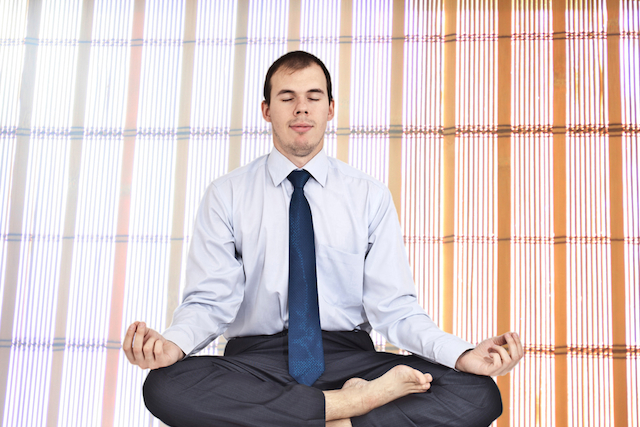 Man Meditating at Work