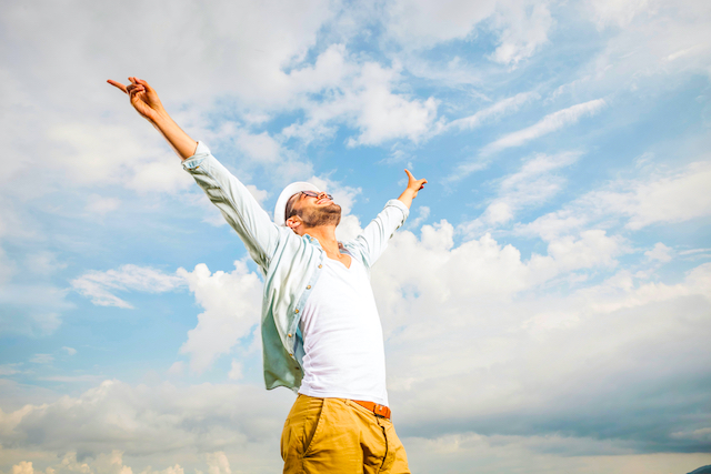 Man with Arms Up in the Air
