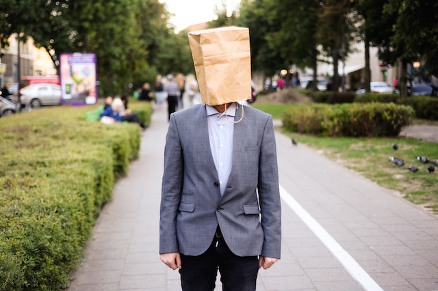 Man with Bag on Head