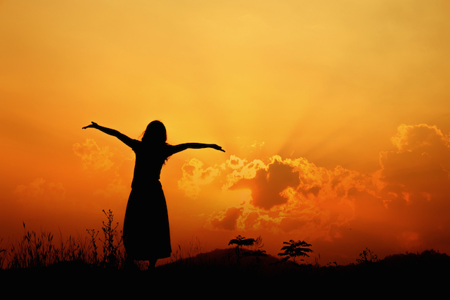 Woman Standing in the Sun